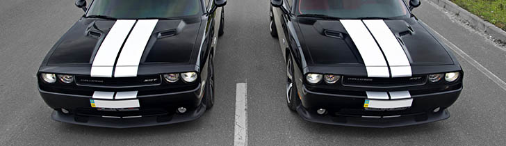 Two Dodge Challengers next to each other
