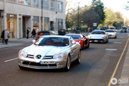 Group of supercars is driving through London