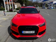 Red Audi RS6 Avant betrays its sportiness