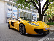 Jenson Button's McLaren MP4-12C Spider looks great in yellow