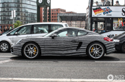 This Porsche Cayman S has a psychedelic wrap
