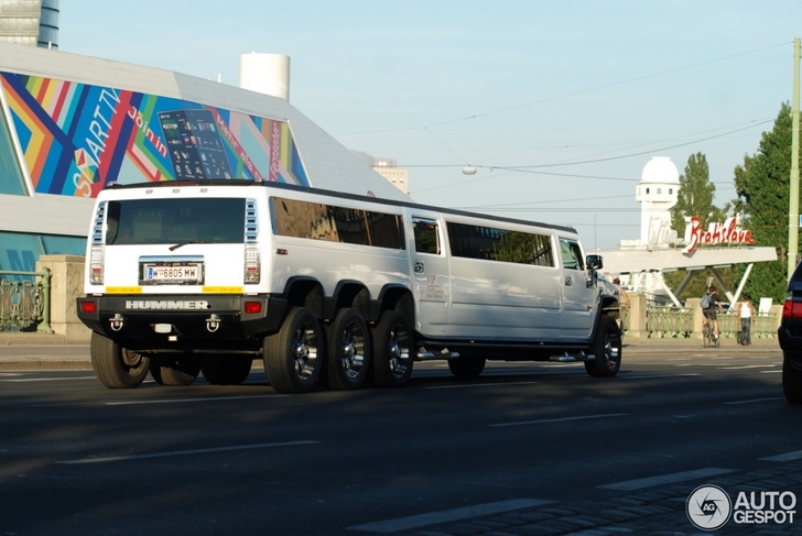 Not four, not six but eight wheels on this Hummer!