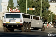 Not four, not six but eight wheels on this Hummer!