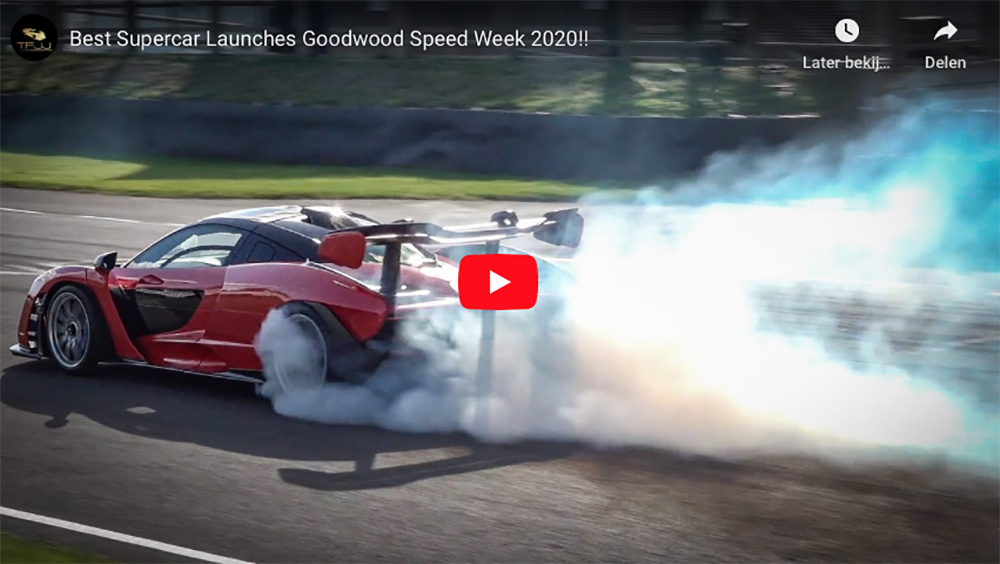Supercars doing burnouts during Goodwood Speedweek
